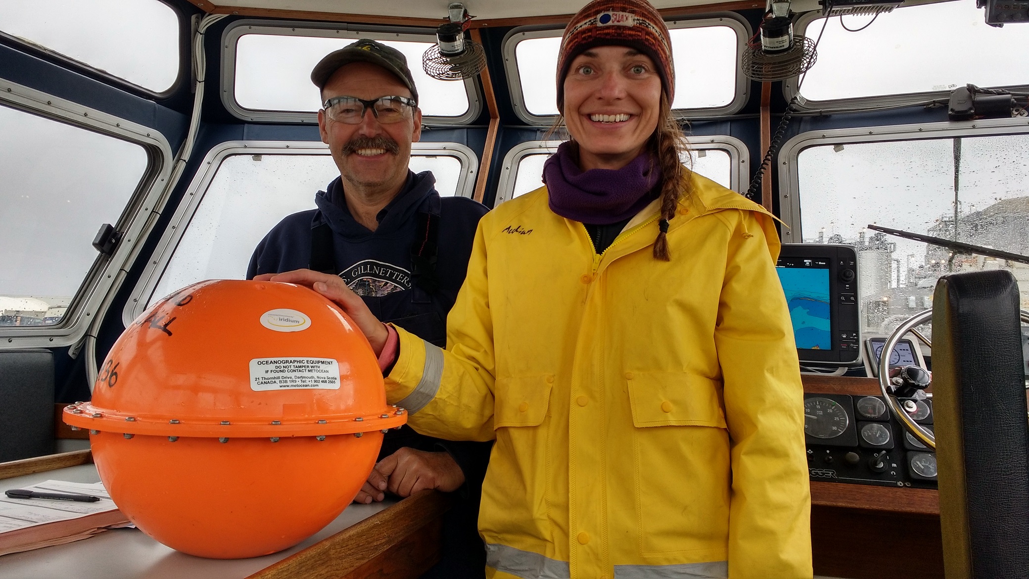 Spill Response Team members practice with MetOcean iSphere oil spill tracking buoys